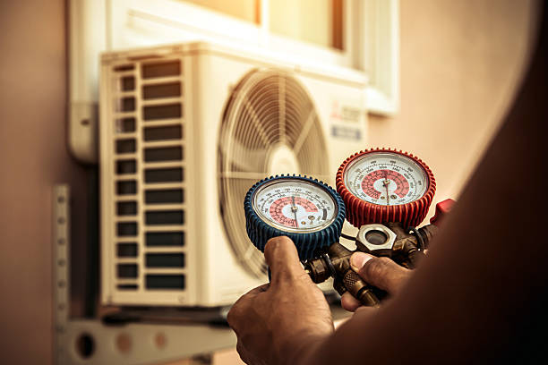 Professional Ductwork Repair technician working in Hartland, WI